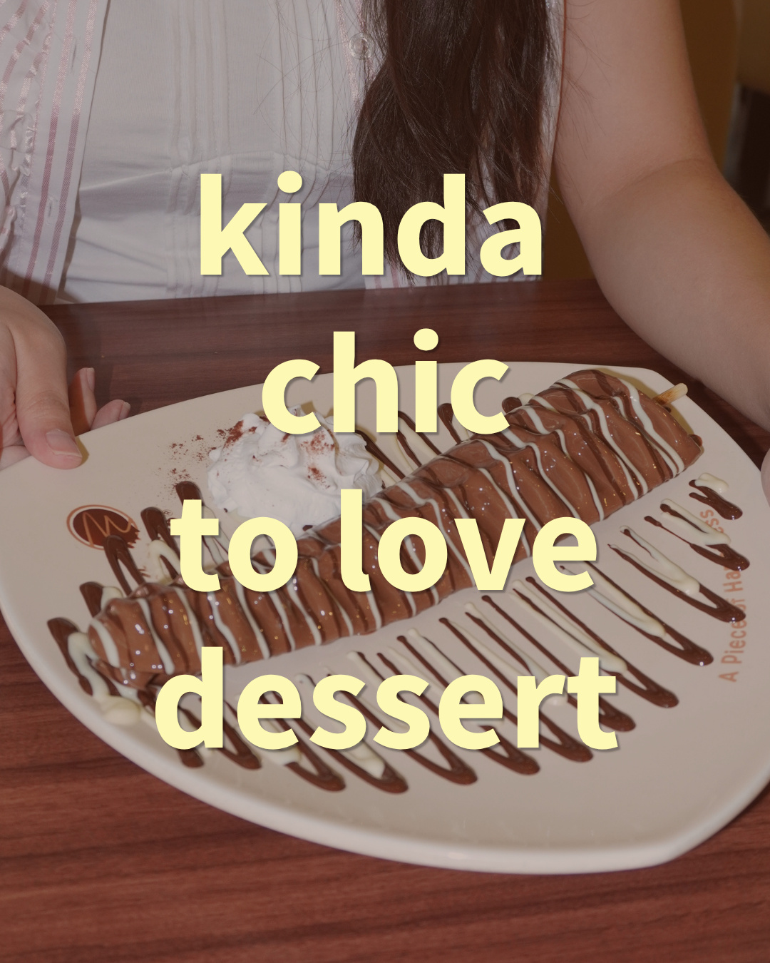 A woman holding a plate with a chocolate-drizzled crepe roll, with the text 'kinda chic to love dessert' (slide 1 of 3)